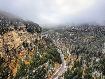 Landscape view of Spearfish Canyon scenic drive in the Black Hills of South Dakota. Clouds looming overhead.