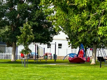 Part of the playground at Evans Park in Spearfish, SD - picnic area.