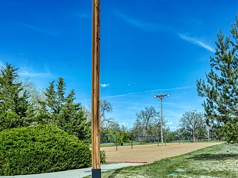 Four volleyball courts at Founders Park. Early spring under blue skies.