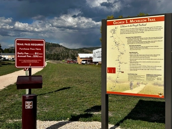The map, pay box, and information sign for the Pringle, SD Mickelson Trail trailhead.
