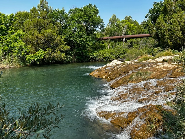 Cascade Falls swimming hole just south of Hot Springs, SD. Warm 67 degree, turquoise water.