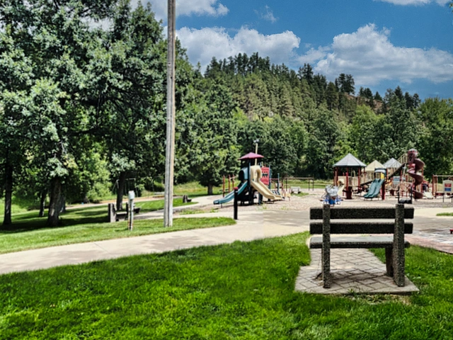 Woodland Park in Sturgis, South Dakota with picnic area and playground.