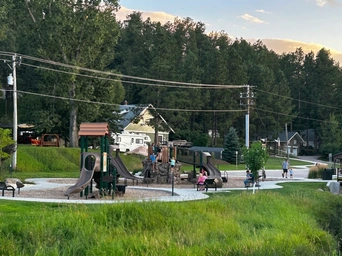 Harbach public park in Custer, SD. Playground with the Black Hills in the background.