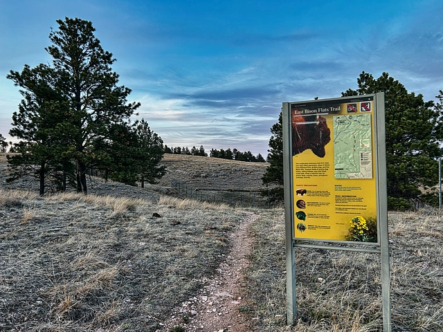 East Bison Flats Trailhead with informational sign about the hike through Wind Cave Park.