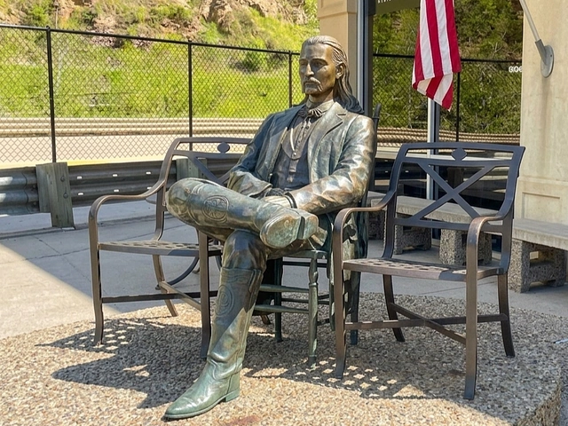 Sitting Bill - Statue of Buffalo Bill Cody in Deadwood, SD.
