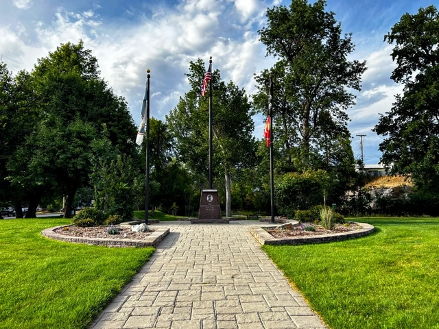 Veteran's Memorial across the street from Spearfish City Park. Flags and granite stone point of interest.