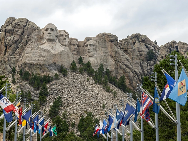 Mount Rushmore and the flags lining the pathway.