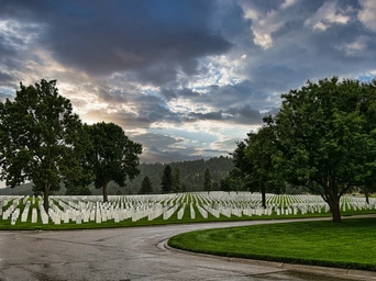 Rows of white military headstones in the Fort Meade, South Dakota National Cemetery.