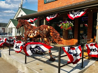 Iron Star metal horse sculpture in front of Jewel of the West in Hill City - Black Hills.