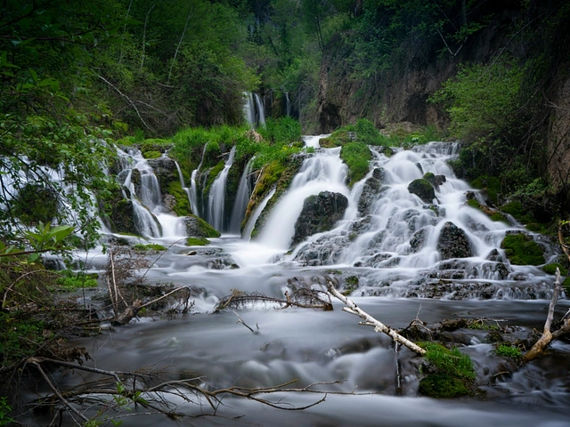 Roughlock Falls in Spearfish Canyon. Waterfall tumbling over mossy rocks.