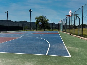 Public outdoor basketball court in Butler Park in Hot Springs, SD.