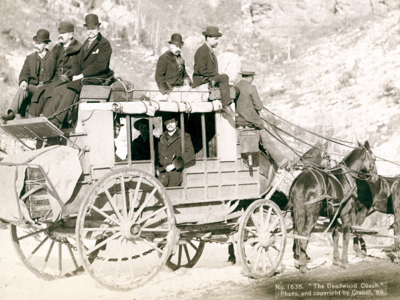 The Deadwood Coach stagecoach - original image in sepia tones - Black Hills of South Dakota.
