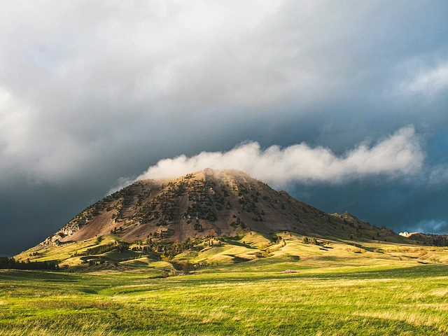 Bear Butte State Park - Peak with clouds and grassland. Scenic SD hiking trails.