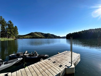 Fishing kayaks at the dock at Sheridan Lake in Hill City South Dakota, a Black Hills favorite vacation destination.