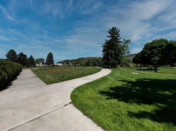 The walkway through Nordemeer Formal Gardens in Sioux Park in Rapid City.