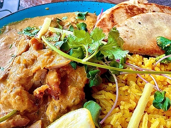Silk Road Experience Pakistani food with curry and rice, in Hot springs, South Dakota.