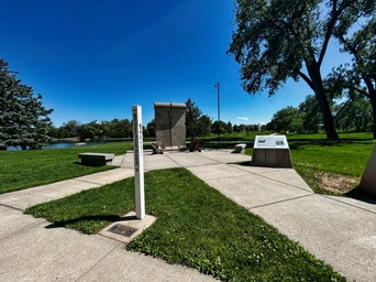Artifacts and interpretive signs at the Berlin Wall Memorial in Rapid City, South Dakota.