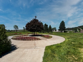 A circle of several flower types inside Nordemeer Formal Gardens in Rapid City, SD.