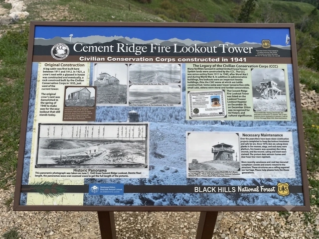 Informational sign at Cement Ridge Fire Lookout Tower in Wyoming Black Hills. Scenic overlook and historic location.