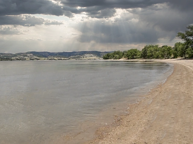 Angostura Reservoir in South Dakota. Beach, water, and storm clouds.