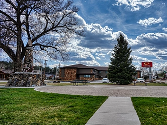 Way Park courtyard with picnic tables and monument oin downtown Custer, SD.