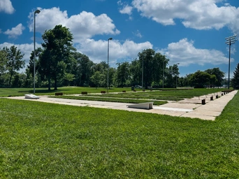 A long row of horseshoe pits and corn hole games at Sioux Park in Rapid City, SD.