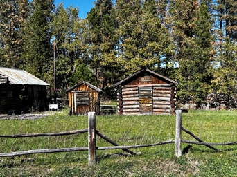 Old log cabin in Rockerville Ghost Town in the Black Hills of South Dakota.