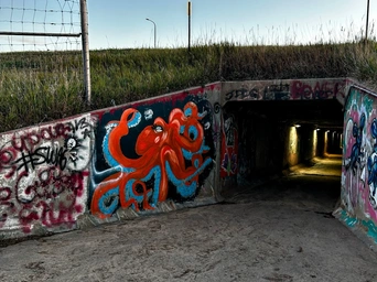 The tunnel under the highway at the Lookout Mountain trailhead in Spearfish, SD. Graffiti.