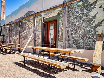 Mural by Ross Burden at Silk Road Experience on River Street in Hot Springs, SD.