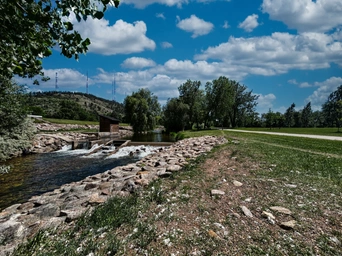 The river and walking path in Sioux Park - Rapid City, South Dakota.